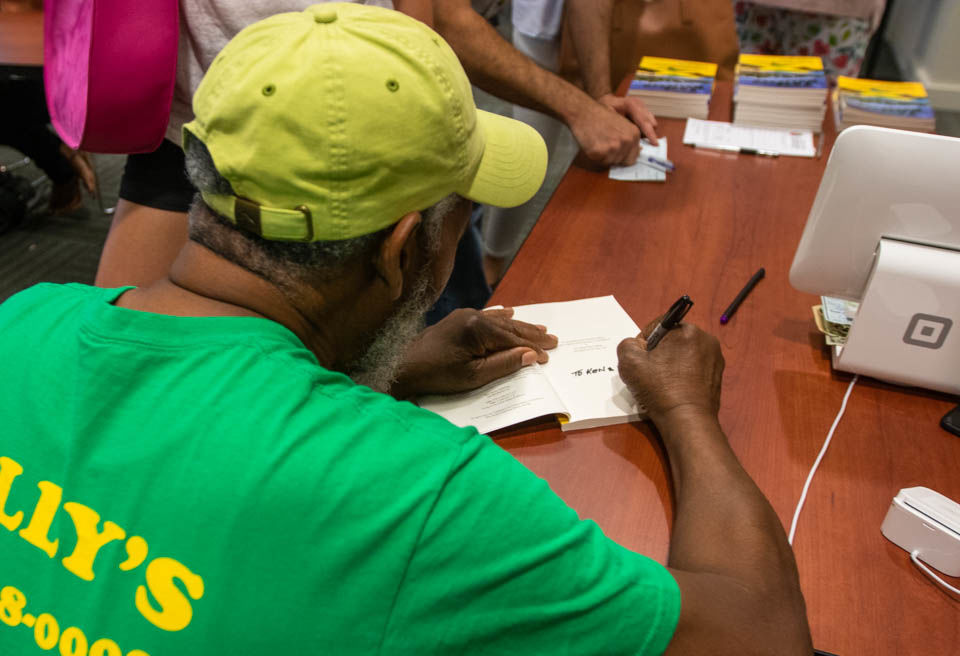 Kelly Codling signing book True Believer